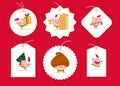 Vector collection of christmas gift tags and badges different shapes isolated on red background. Royalty Free Stock Photo