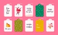 Vector collection of christmas gift tags and badges isolated on pink background. Royalty Free Stock Photo