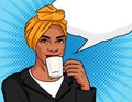 Black woman is drinking coffee.