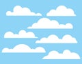 Vector colorful flat style illustration of a fluffy clouds on a background of a blue sky. Royalty Free Stock Photo