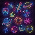 Set of space neon lamp icons. Glowing rocket, planets, alien, sun, moon, comet and stars on brick wall background Royalty Free Stock Photo