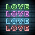 Vector Colours Bright Inscription Love, Neon Sign. Isolated Design Element for Valentine`s Day. Retro Sign Board Royalty Free Stock Photo