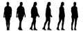 Vector concept conceptual black silhouette of a casually dressed woman walking from different perspectives isolated on white