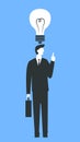 Vector concept illustration of a businessman with a creative idea. Man in a suit and with a briefcase standing with a