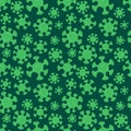 Vector COVID-19 seamless pattern. Image of a coronavirus bacteria on a dark green background. Pandemic and the spread of the virus Royalty Free Stock Photo