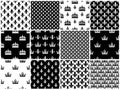 Vector crowns and fleur de lis seamless patterns set in black Royalty Free Stock Photo