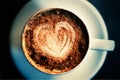 Vector cup of coffee with heart pattern. Vector.