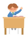 Vector cute happy schoolboy sitting at the desk with hand up. Elementary school classroom illustration. Clever kid in glasses at