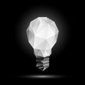 3d low poly light bulb model. Glowing polygonal bulb illustration on a black background