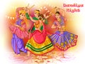 Indian Couple playing Garba in Dandiya Night Navratri Dussehra festival Royalty Free Stock Photo