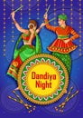 Indian couple playing Garba in Dandiya Night Navratri Dussehra festival of India