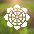 Vector Dharma Wheel in Lotus Flower on a Cosmic Background Royalty Free Stock Photo