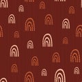 Vector dotted rainbow childish seamless pattern background. Rich earthy brown backdrop with hand drawn rainbows and dots