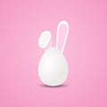 Vector egg with Easter bunnys ears on the pink background