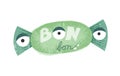 Graphic element to Halloween. Cute three eyed monster stylized as bonbon