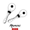 Hand drawn sketch of musical maracas in black isolated on white background. Detailed vintage etching style drawing. Royalty Free Stock Photo
