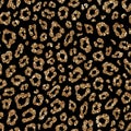 Fashion seamless pattern with gold glitter leopard fur. Sparkle animal skin on black background