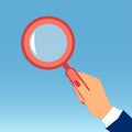 Vector of a female hand holding a magnifying glass Royalty Free Stock Photo