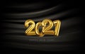 Vector festive banner with volumetric golden numbers 2021 on the background of folds of black silk. Realistic New Year background