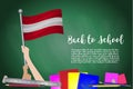 Vector flag of austria on Black chalkboard background. Education Background with Hands Holding Up of austria flag. Back to school