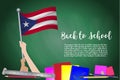 Vector flag of Puerto Rico on Black chalkboard background. Education Background with Hands Holding Up of Puerto Rico flag. Back t