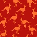 Vector flat illustration with silhouette kangaroo and baby kangaroo on fiery background. Seamless pattern on orange Royalty Free Stock Photo