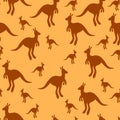 Vector flat illustration with silhouette kangaroo and baby kangaroo on fiery background. Seamless pattern on orange