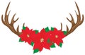 Red poinsettia flowers on deer antlers