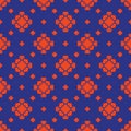 Vector floral geometric seamless pattern. Ornament in orange and blue color Royalty Free Stock Photo