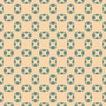 Abstract geometric seamless pattern with small ovate shapes. Green and beige