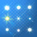Vector glowing sun light sparks on blue background. Royalty Free Stock Photo