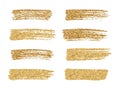 Vector gold paint smear stroke stain set. Abstract gold glitteri Royalty Free Stock Photo