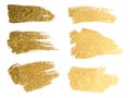 Vector gold paint smear stroke stain set. Abstract gold glitteri Royalty Free Stock Photo