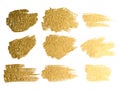 Vector gold paint smear stroke stain set. Abstract gold glitteri Royalty Free Stock Photo