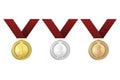 Vector gold, silver and bronze award medals with red ribbons set on white background. The first, second, third Royalty Free Stock Photo