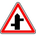 Vector graphic of a uk staggered junction ahead road sign. It consists of a depiction of the road layout contained within a red