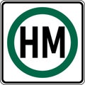 Vector graphic of a usa Hazardous Materials Route MUTCD highway sign. It consists of a green circle enclosing the letters HM Royalty Free Stock Photo