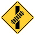 Vector graphic of a usa skewed railroad crossing highway sign. It consists of a rail track crossing a road at 45 degrees within a Royalty Free Stock Photo