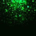 Vector green glowing light glitter background