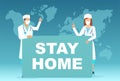 Vector of a group of doctors medical staff wearing masks and holding message board asking people to stay home Royalty Free Stock Photo