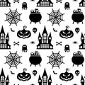 Vector Halloween seamless pattern. Black icons of skull, spider, pumpkins. Royalty Free Stock Photo