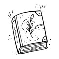 Vector hand drawn doodle magic book cartoon. Wizard book of spells. Herbal book Royalty Free Stock Photo