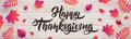 Vector Hand drawn Happy Thanksgiving typography poster with fallen leaves on wood background