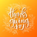 Vector hand drawn lettering - thanksgiving day - with doodle decorative plant branches.