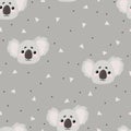 Vector hand drawn seamless pattern with cute koala bear face in cartoons style on begie background with dots. Repeated background Royalty Free Stock Photo