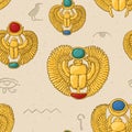 Seamless pattern with golden egyptian scarabs with hieroglyphs