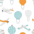 Vector hand-drawn seamless repeating children simple pattern with air balloons and planes in Scandinavian style on a Royalty Free Stock Photo