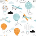 Vector hand-drawn seamless repeating children simple pattern with air balloons, clouds and planes in Scandinavian style Royalty Free Stock Photo