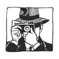 Vector hand-drawn sketch of a man in a hat with a camera pressing a button. Illustration of a noir detective with a secret agent Royalty Free Stock Photo