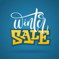 Vector hand written winter phrase - Winter sale. Typography poster on blue background. Vector illustration for banners, f